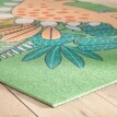 Protišmykový koberec v tvare dinosaura