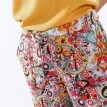 Szerokie spodnie z paskiem i wzorem paisley