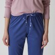 Jednobarevné pyžamové kalhoty s mašlí s potiskem květin