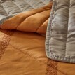 Prošívaný přehoz na postel s etno vzorem