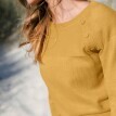 Sweter w jednolitym kolorze z guzikami na ramionach
