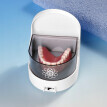 Urządzenie do czyszczenia protez zębow.