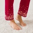 Hosszú pizsamanadrág virágmintával a lábszárvégeken
