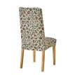 Pružný poťah s leopardím vzorom na stoličku