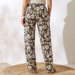Široké nohavice s potlačou rastlín