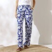 Vzdušné široké nohavice s rastlinnou potlačou