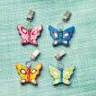 4 klipsy do obrusu Motyl