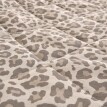 Polstrovaný potah s leopardím vzorem na pohovku typu harmonika