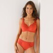 Biustonosz z elastycznej bawełny na fiszbinach marki Confidence Lingerie® w jednolitym kolorze z ażurowym haftem