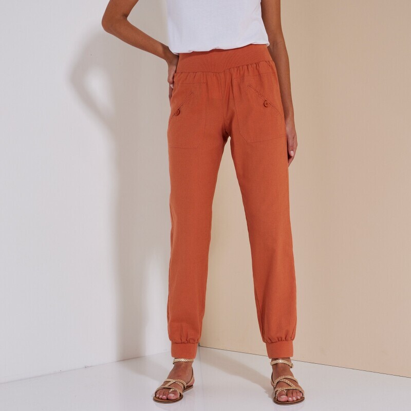 Długie spodnie wykończone elastycznymi obszyciami