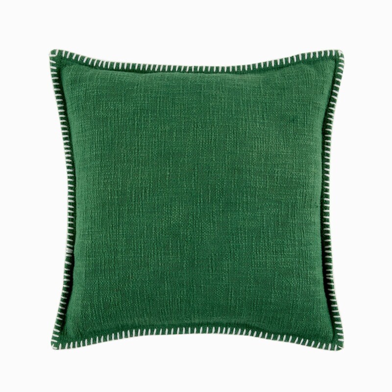 Jednofarebný vankúšik s textúrou zakončený
ozdobným stehom