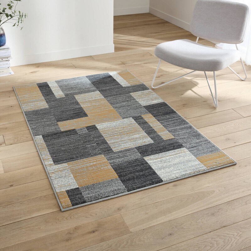 Dekoratívny koberec s patchwork vzorom