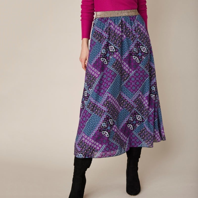     Dlouhá rozšířená sukně s patchwork potiskem