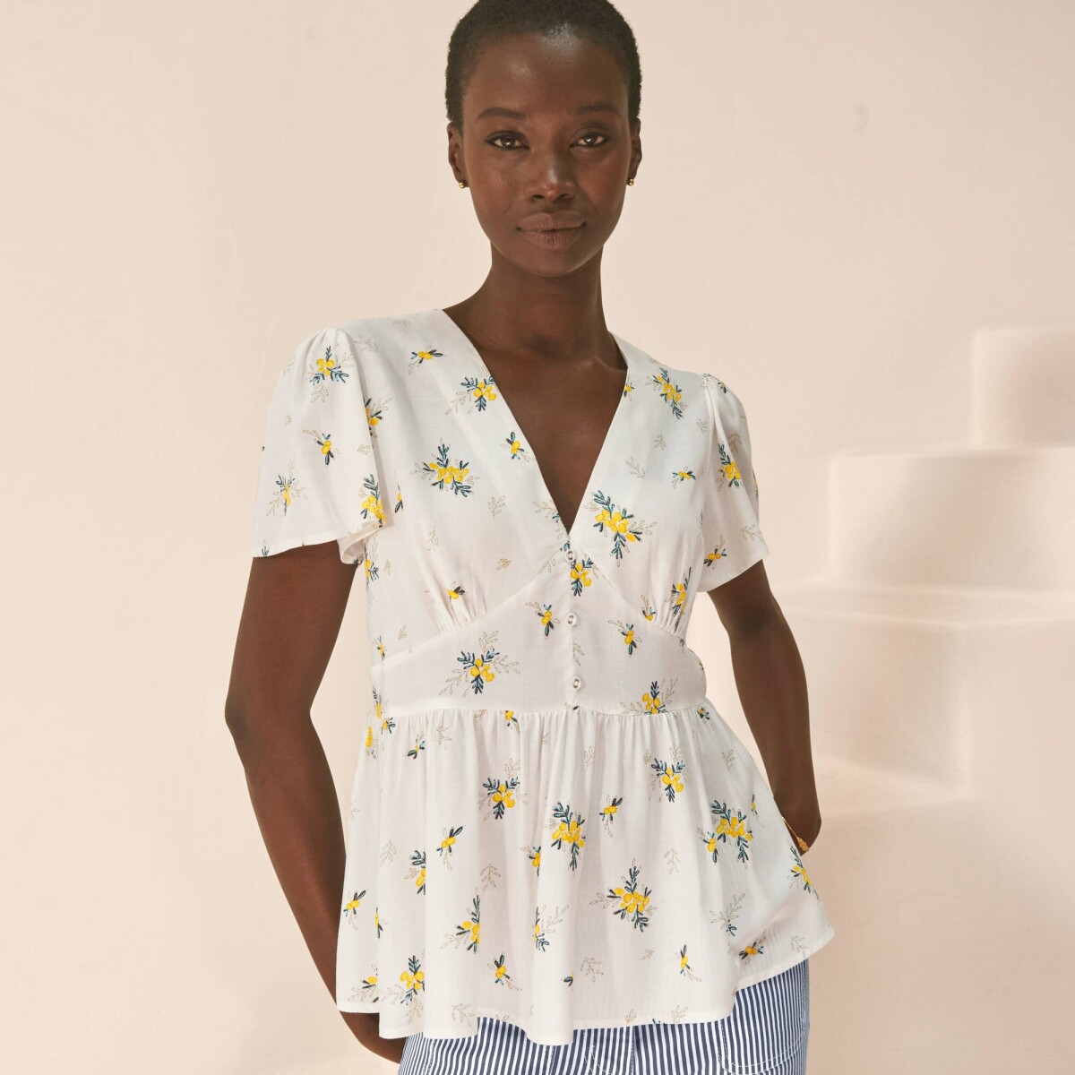 Blúzka s kvietkovanou
		potlačou