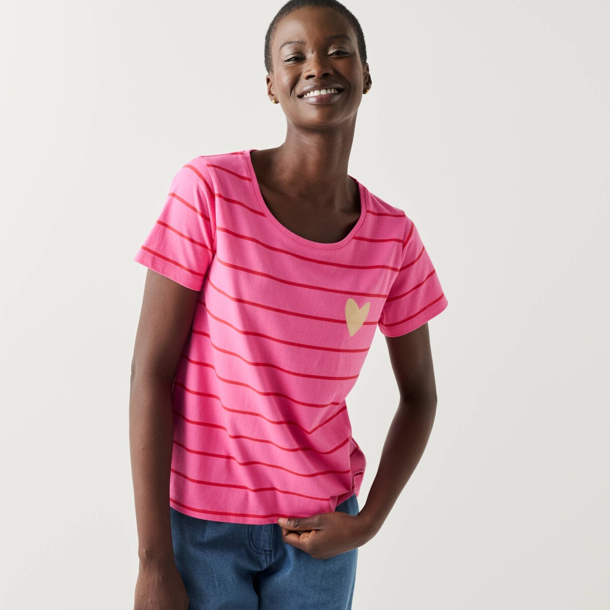 Pruhované tričko s potlačou zlatého srdiečka