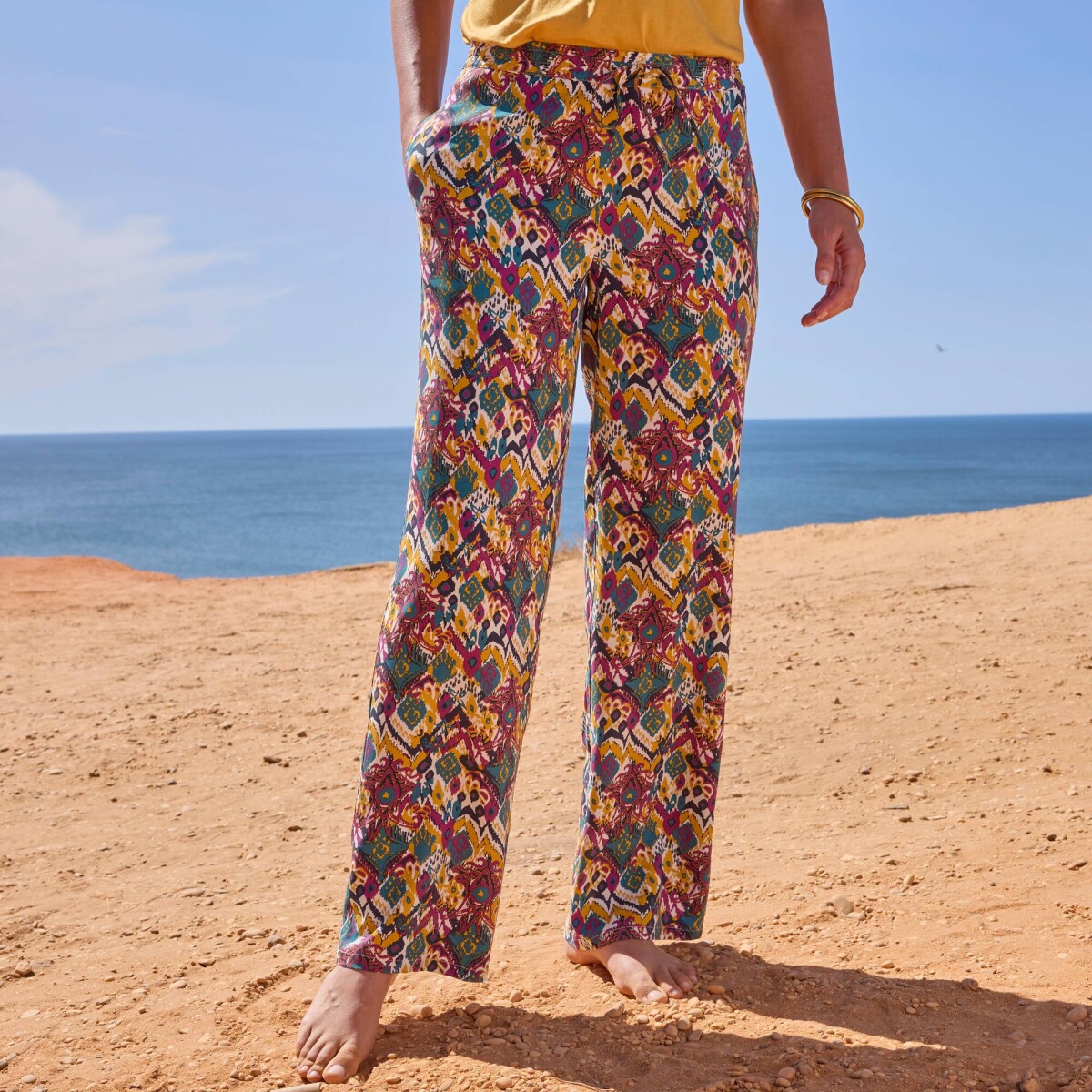 Široké nohavice s pružným pásom a potlačou