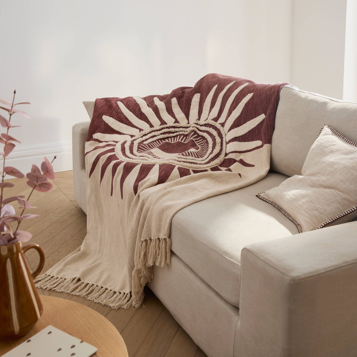 Plied s textúrovaným efektom a motívom slnka