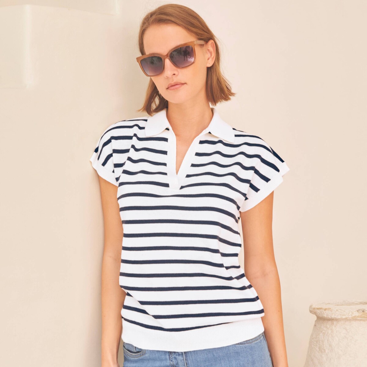 Pruhovaný pulóver s polo golierom a krátkymi rukávmi