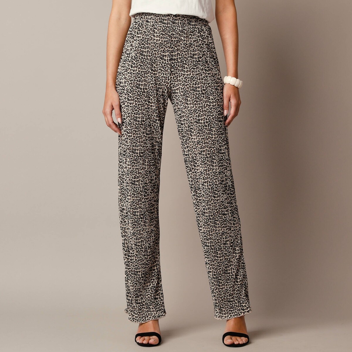 Nohavice z lesklého plisovaného úpletu s potlačou