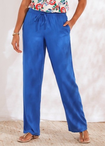 Jednobarevné široké splývavé kalhoty s pružným pasem, z viskózy