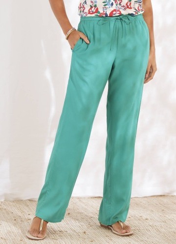 Jednobarevné široké splývavé kalhoty s pružným pasem, z viskózy