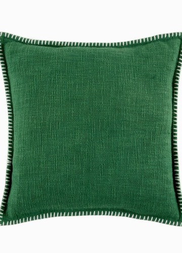 Jednofarebný vankúšik s textúrou zakončený
ozdobným stehom