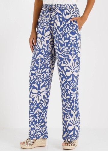 Široké splývavé kalhoty s potiskem