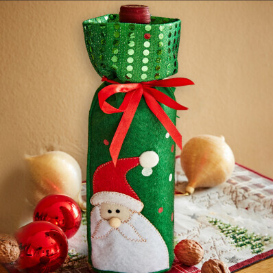 Ozdobný obal na láhev Santa