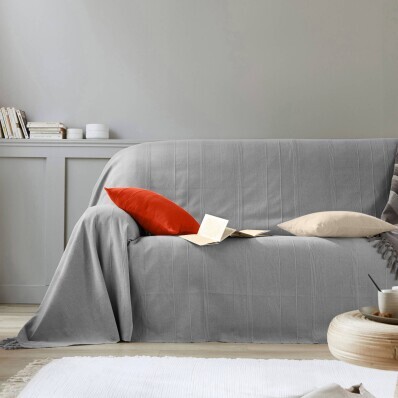 Colecție de cuverturi și fețe de pernă țesute manual, în culori uni