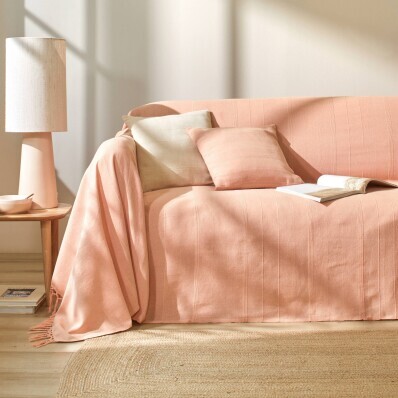 Colecție de cuverturi și fețe de pernă țesute manual, în culori uni