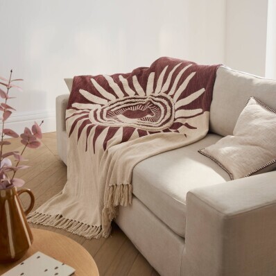 Pléd s texturovaným efektem a motivem slunce