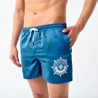 Plavkové jednobarevné šortky s kontrastním vzorem